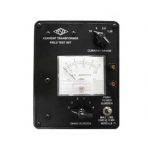 The amp current transformer burden test set is housed in a non-conducting black molded plastic case with white panel markings.