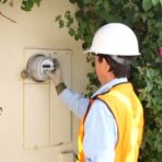 Man Replacing a Meter