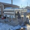 Commercial electric meter farm installation featuring high-density multi-position socket configurations for multi-family utility distribution.